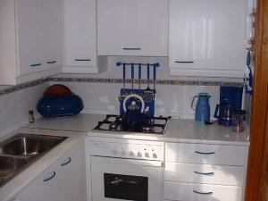 Kitchen leading to ulitlity room
