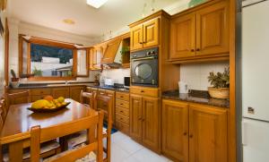 Complete fitted kitchen mountain views