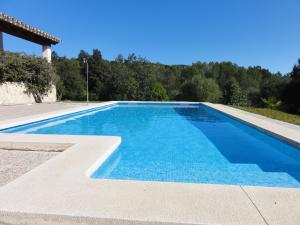 Swimming pool 9 x 4 metres with underwater lights.